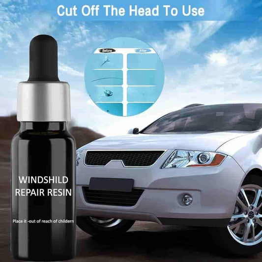 Bottle of windshield repair resin with a car in the background